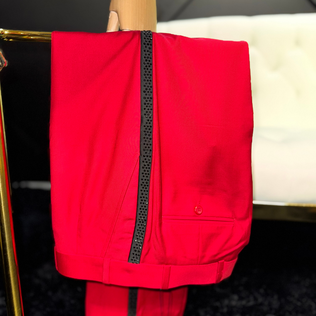 Red suit with black cross and black embellishments