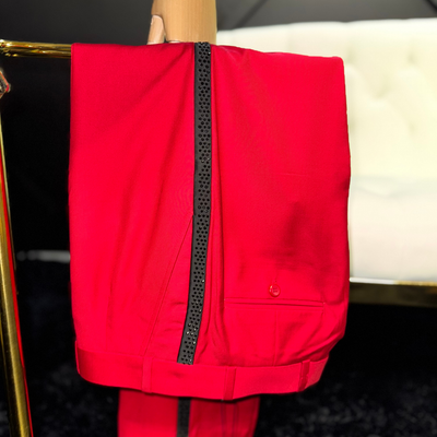 Red suit with black cross and black embellishments