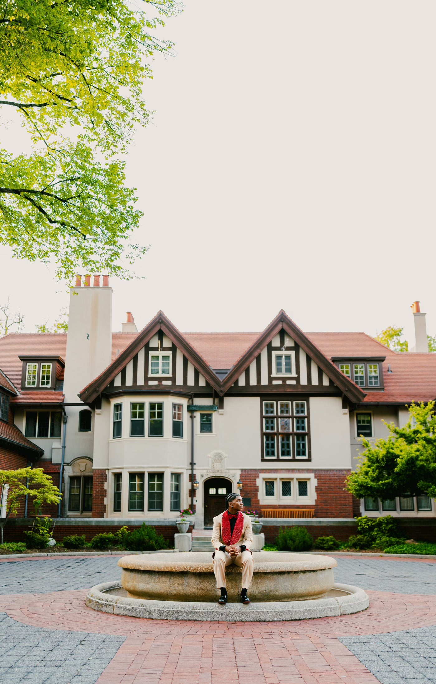 Tan suit with red crystalized lapel