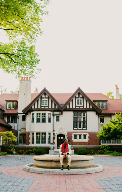 Tan suit with red crystalized lapel