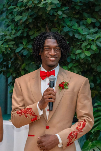 Tan and Red suit with red embellishments