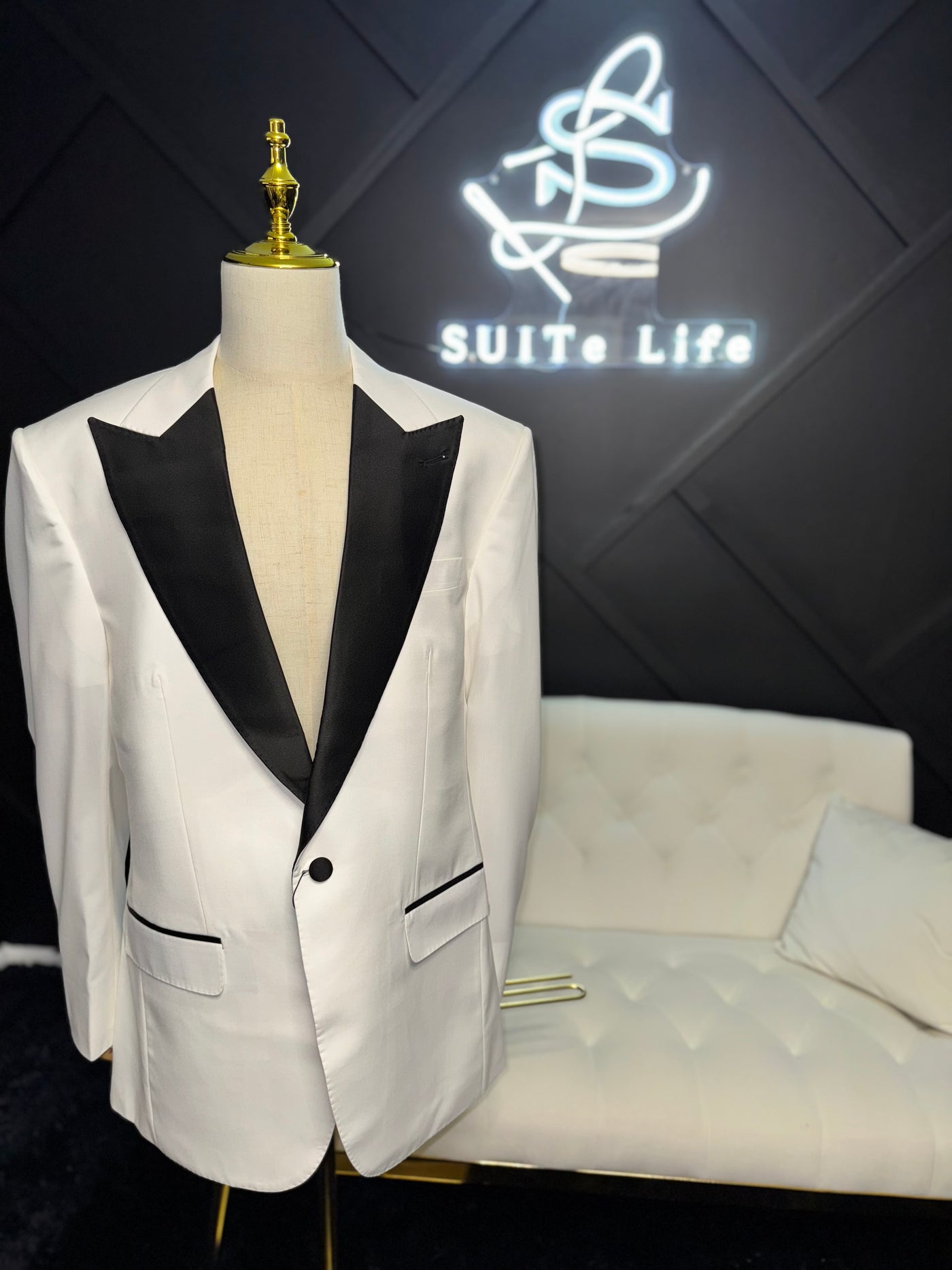 White suit with black lapel