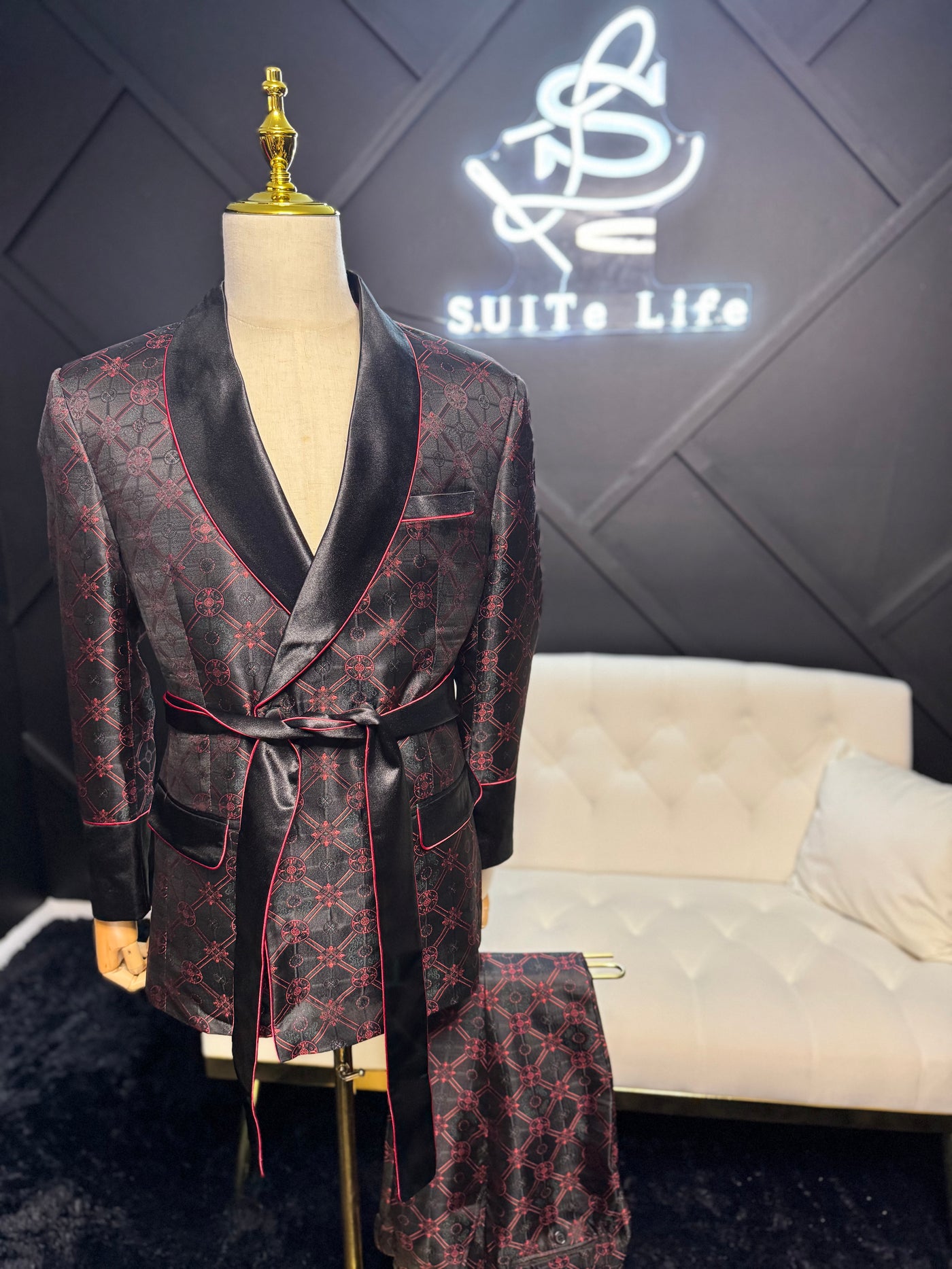 Black and red print suit with rope