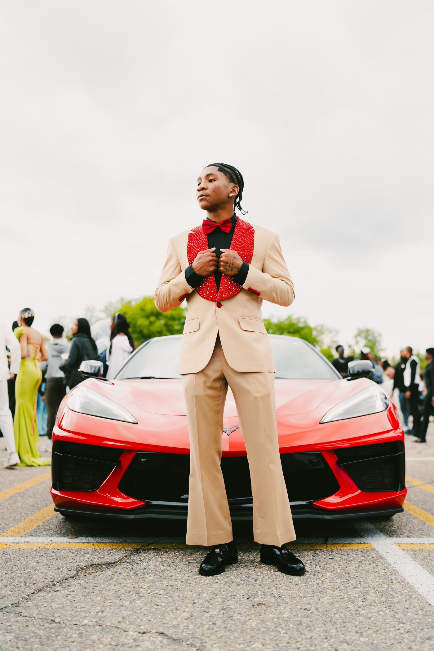 Tan suit with red crystalized lapel