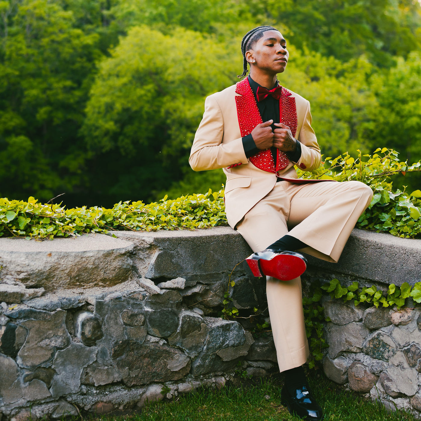 Tan suit with red crystalized lapel
