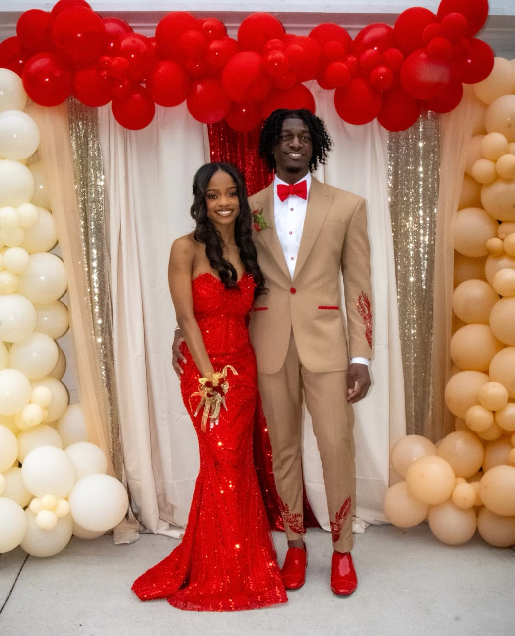 Tan and Red suit with red embellishments